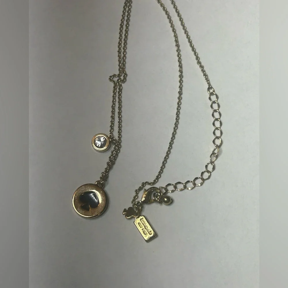 Kate Spade Gold-Tone Charm Necklace – Iconic Spade Cutout & Gem Accent